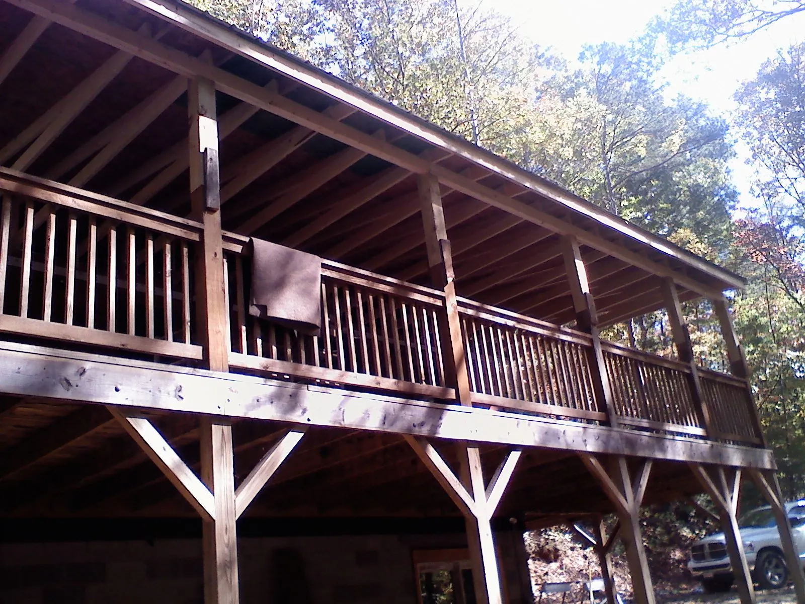 Timber framing under a new elevated porch and deck — Roof Leak Repair in Millers Falls by Roofing Brothers